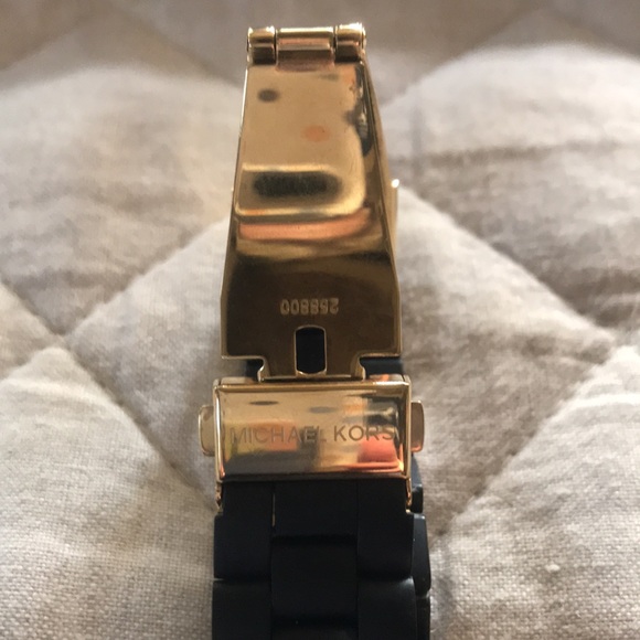 Beautiful Michael Kors black and gold watch